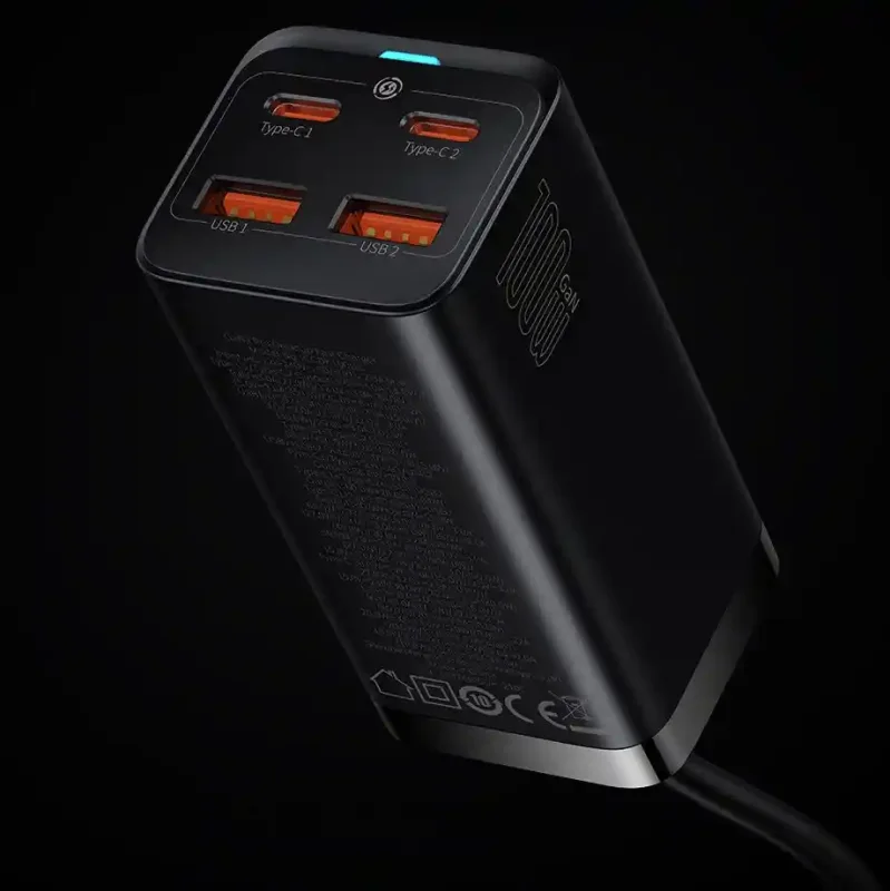 Ładowarka sieciowa Baseus GaN3 Pro 100W – widoczne porty USB-C i USB-A oraz podświetlony wskaźnik pracy, ciemne tło