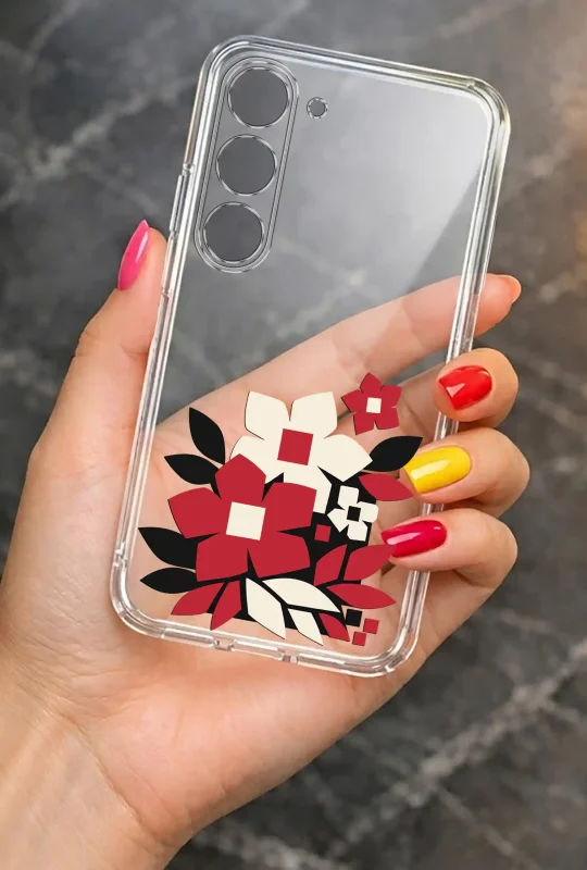 Modne etui do Samsung Galaxy S23 ze stylowym wzorem czerwono-białych kwiatów i czarnych liści, trzymane w dłoni