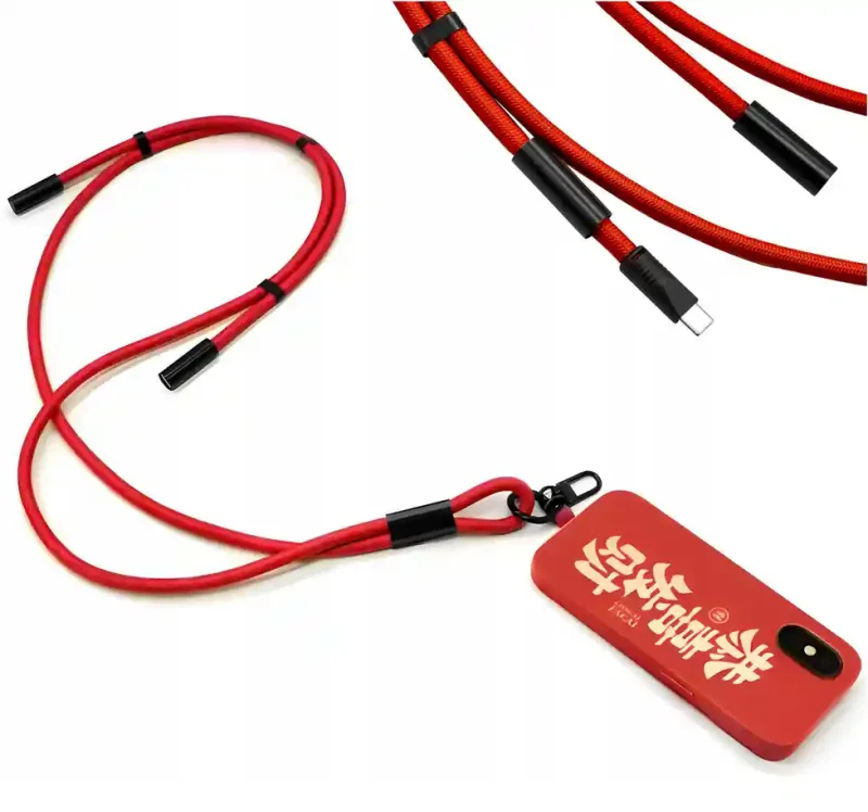 Czerwona smycz do telefonu z kablem USB-C 60W 2w1 przypięta do etui telefonu, z widocznym złączem USB-C