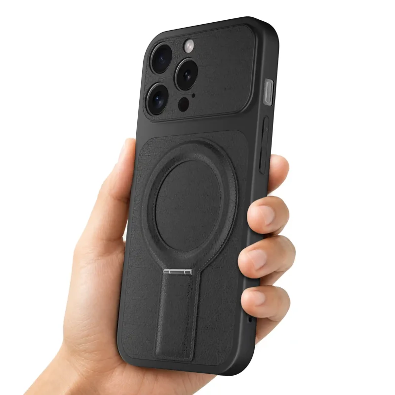 Czarne etui magnetyczne do iPhone 14 Pro prezentowane w dłoni