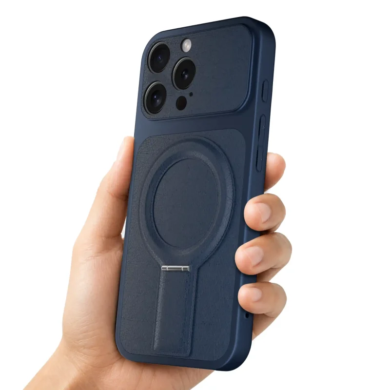 Granatowe etui magnetyczne do iPhone 16 Pro Max prezentowane w dłoni