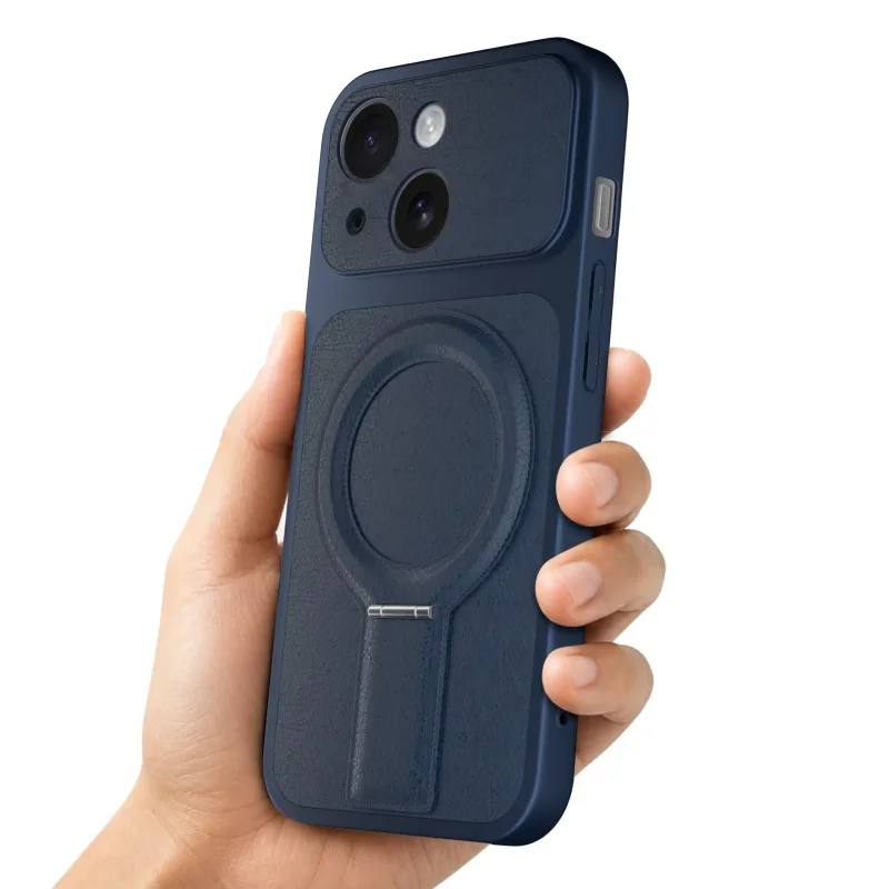 Granatowe etui magnetyczne do iPhone 15 prezentowane w dłoni