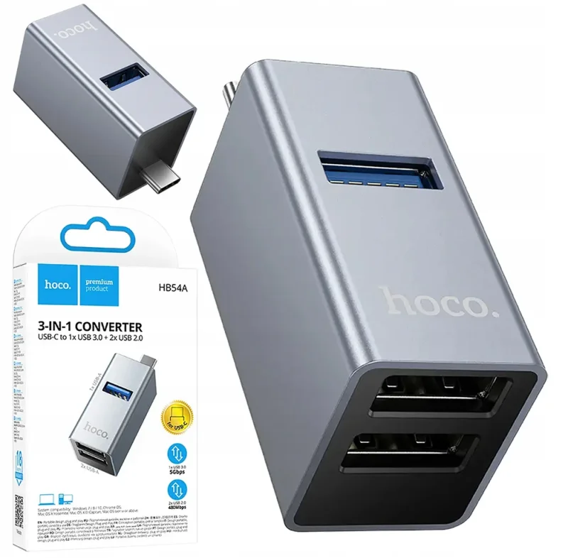 Adapter USB-C Hoco HB54A 3w1 z trzema portami USB-A i aluminiową obudową obok opakowania