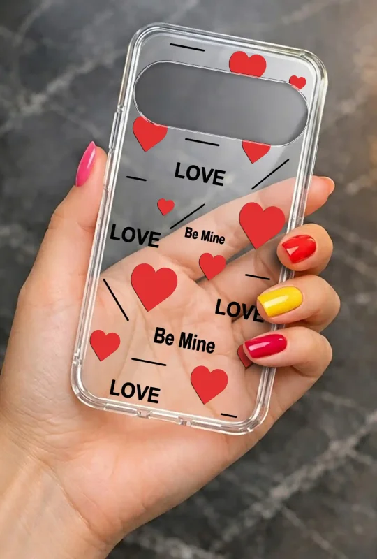 Walentynkowe etui do Google Pixel 11 Pro z czerwonymi sercami i napisami LOVE oraz Be Mine trzymane w dłoni