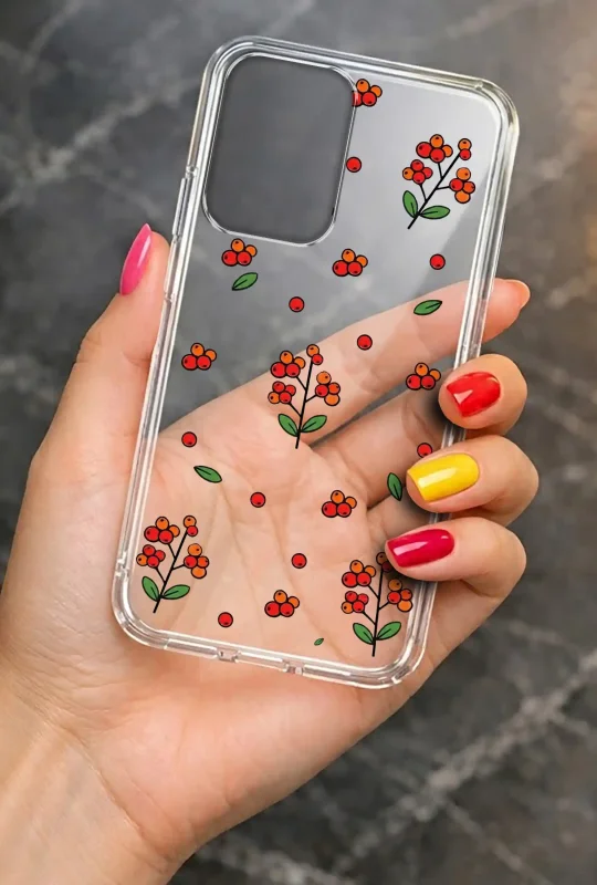 Przezroczyste etui do Motorola Moto G55 5G z motywem czerwonych owoców i zielonych liści prezentowane w dłoni