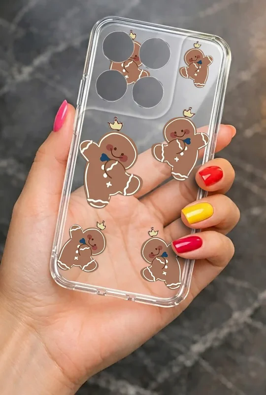 Przezroczyste etui do Motorola Moto G67 | G77 5G z piernikowym wzorem świątecznym prezentowane w dłoni
